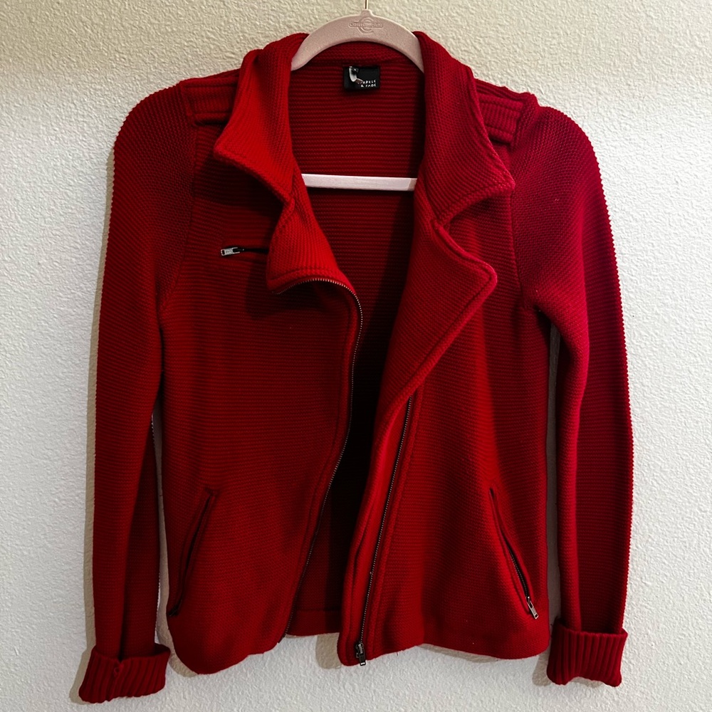 Red sweater motor jacket